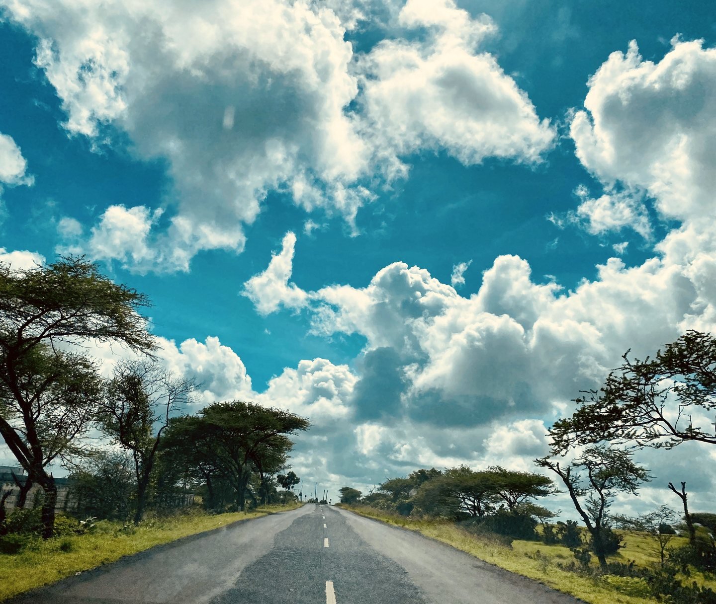 State highway near Rajkot under clouds clearing after rain